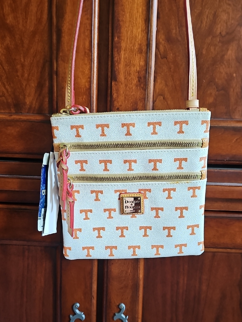 Dooney & Bourke Cream Crossbody with Orange Logo Print